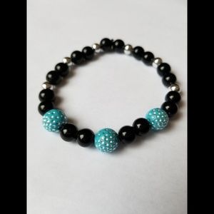 "AQUA-lified UNEEK Piece beaded bracelet